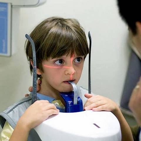 Child undergoing facial scan