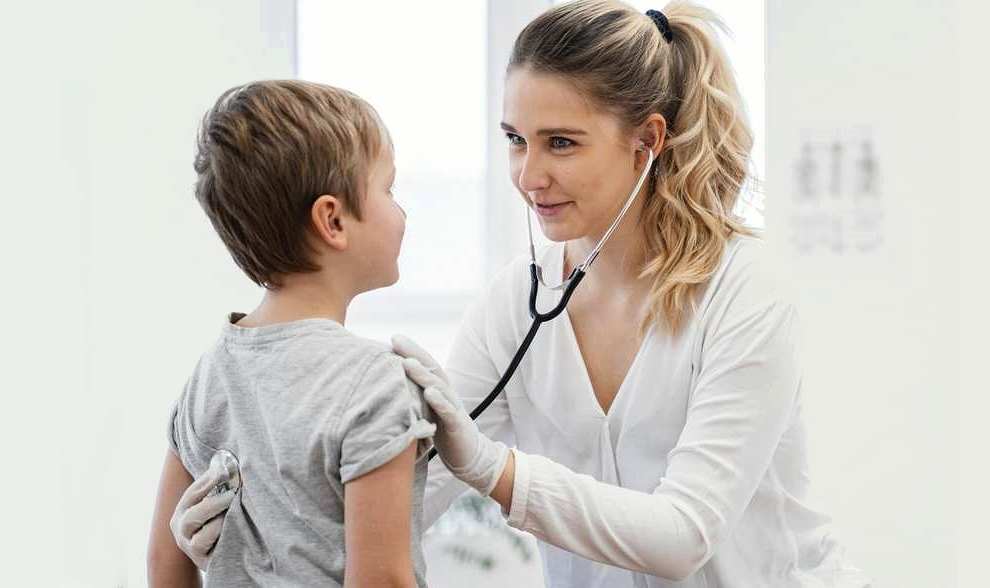 Child being examined by doctor